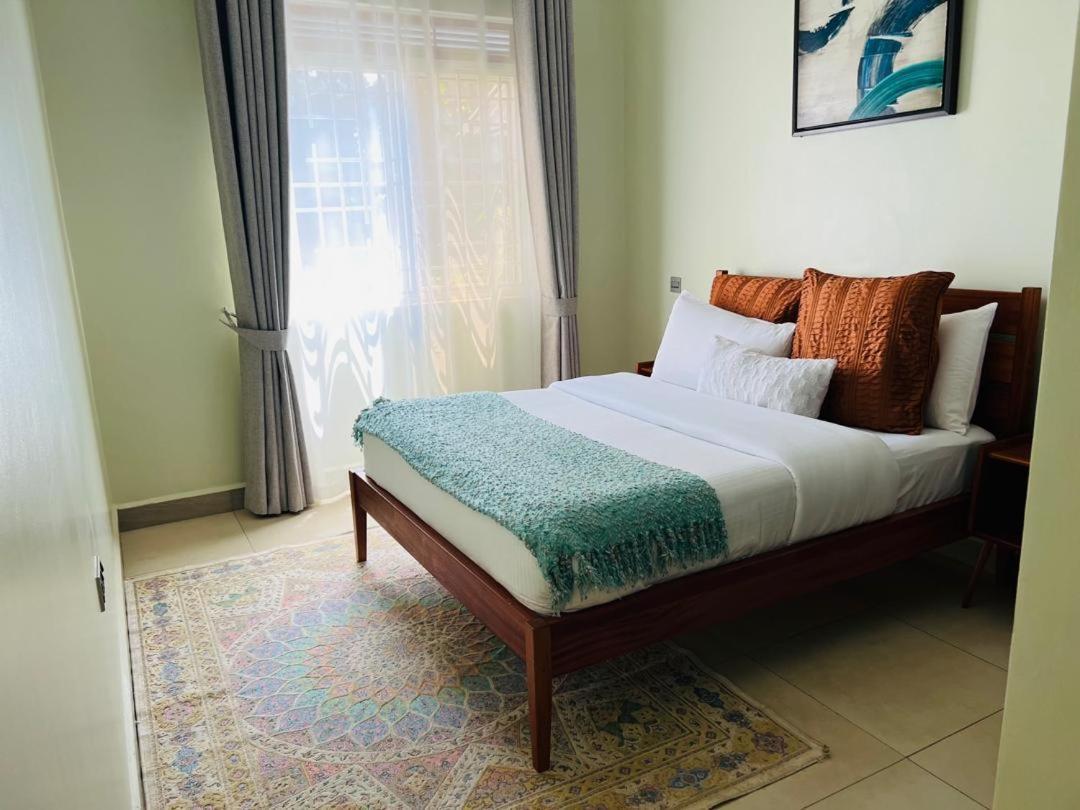 Alsander Homes Peach Bweyogerere Esterno foto
